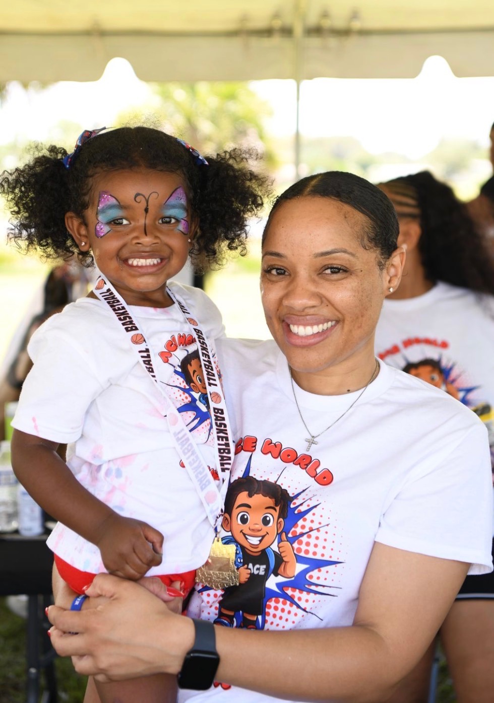 Child with face paint at the event