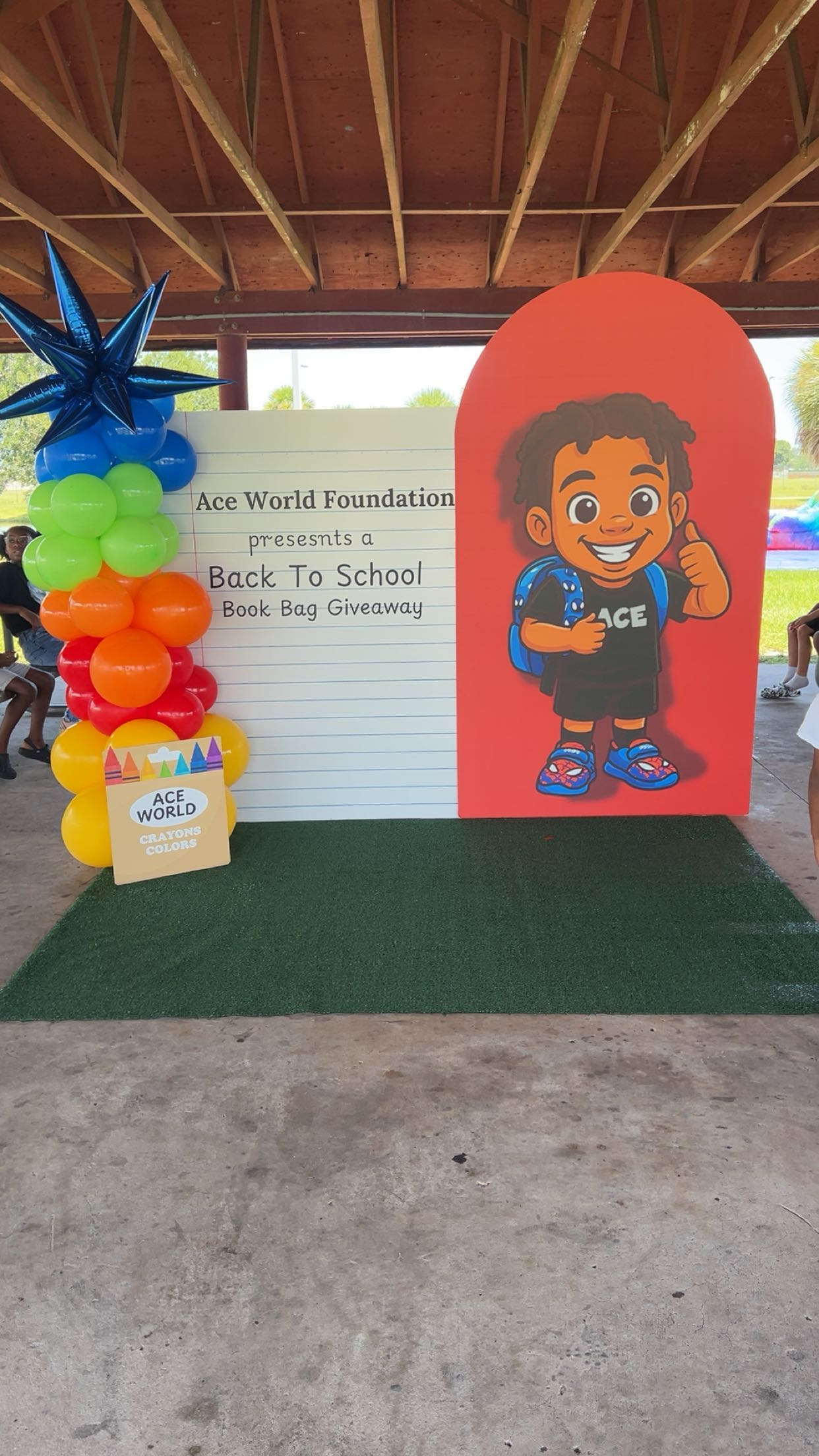 Kids with backpacks at the 2024 giveaway